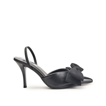A pair of black pencil heels with a bow detail on the toe.