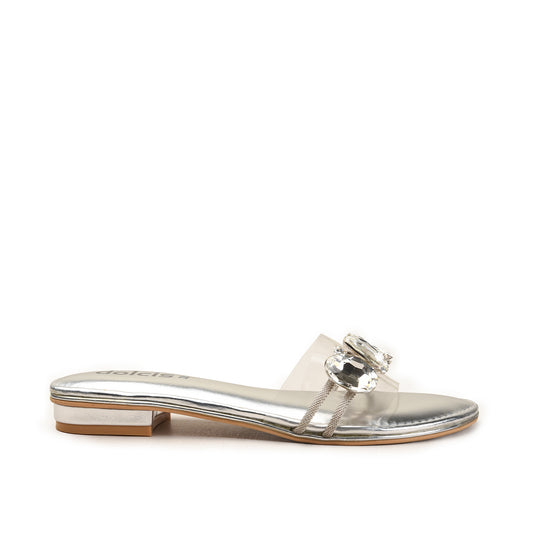 Silver sandal with a decorative strap on a white background